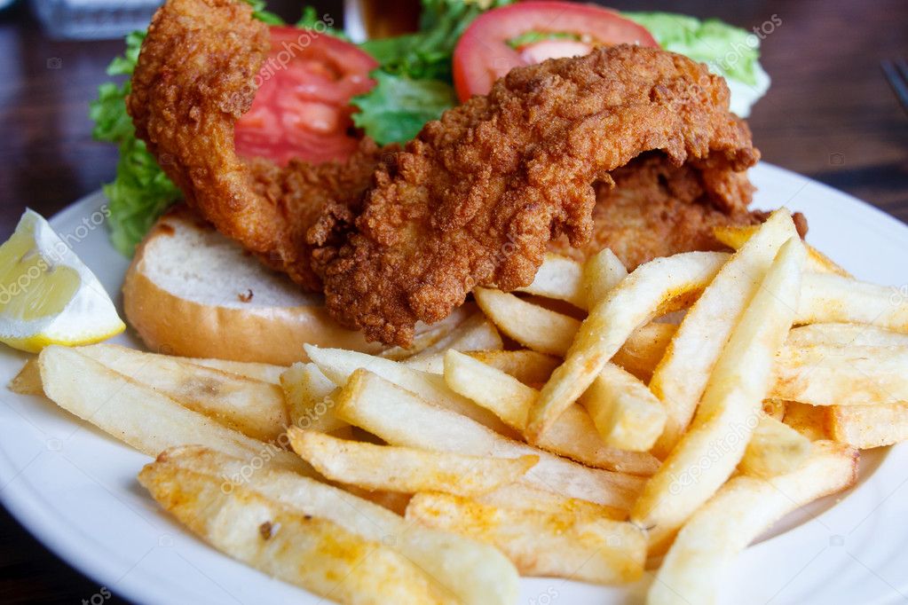 Fried Fish Sandwich and French Fries — Stock Photo © dbvirago #5873190