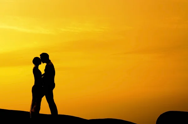 Kissing in sunset — Stock Photo, Image