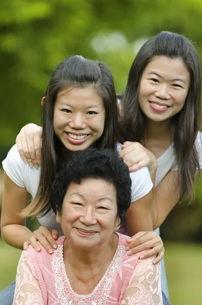 Senior lady and her daughters — Stock Photo, Image