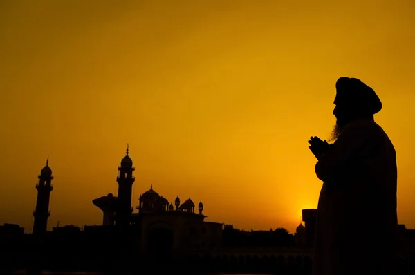 Silhouet van sikh gebed — Stockfoto