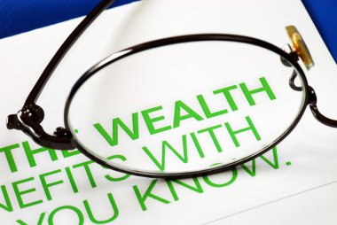 Focus on growth in wealth isolated on blue clipart