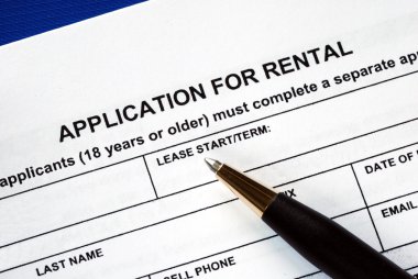 Signed the rental application with a pen clipart