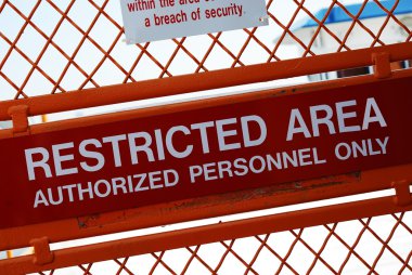 A security sign outside a restricted area clipart