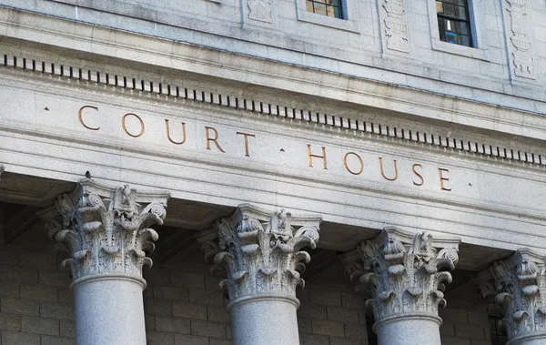 As palavras Court House fora do Supremo Tribunal Imagem De Stock