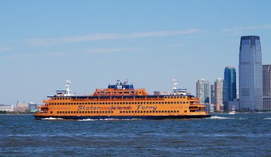 Staten Island Ferry with New Jersey as background clipart