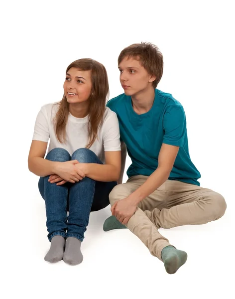 Chlapec a dívka sedící na podlaze — Stock fotografie