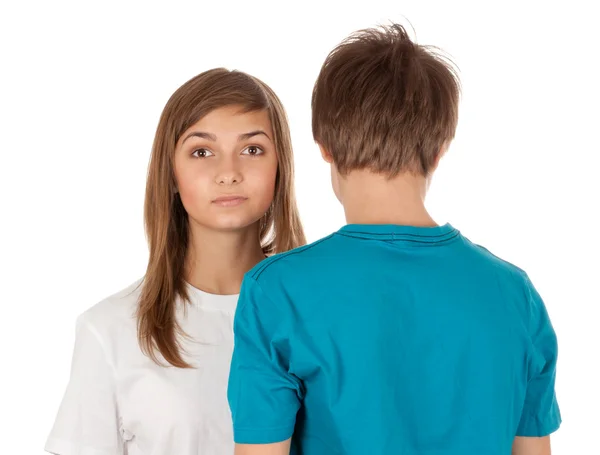 Girl looks out from a guy — Stock Photo, Image