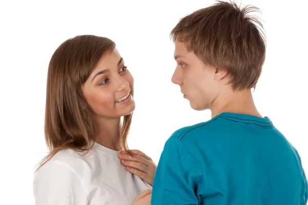 Pair of teenagers looking at each other — Stock Photo, Image