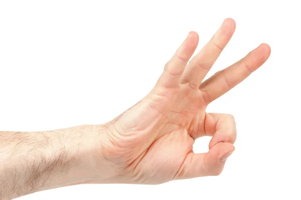Chlupaté muži ruka ukazuje ok — Stock fotografie