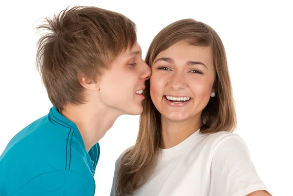 Pojke kysser en flicka — Stockfoto