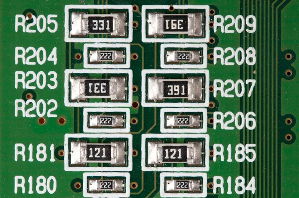 Chipek egy zöld, nyomtatott, elektronikus kártya — Stock Fotó