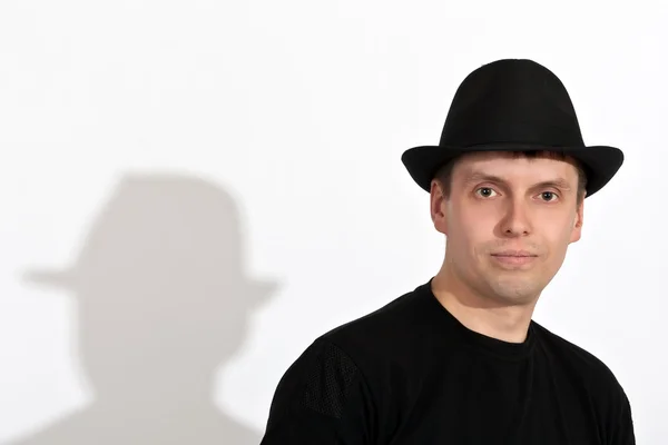 Mann mit schwarzem Hut — Stockfoto