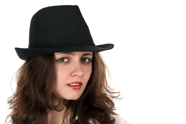 Πορτρέτο του μια όμορφη μελαχρινή σε ένα καπέλο — Φωτογραφία Αρχείου