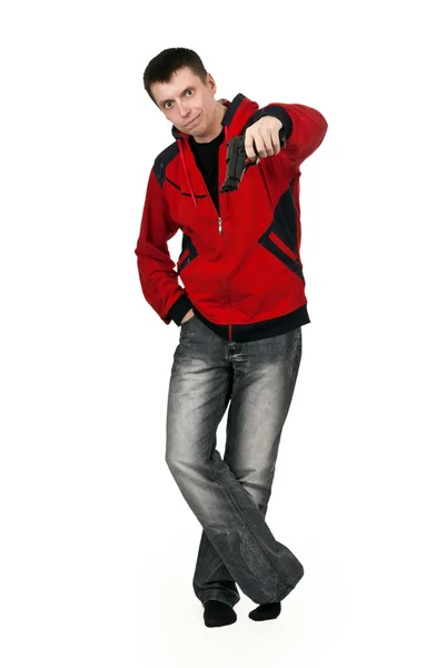 Νεαρό κακοποιό σε ένα κόκκινο πουλόβερ με ένα πυροβόλο όπλο — Φωτογραφία Αρχείου