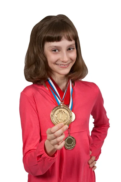 Girl shows gold medal — Stock Photo, Image