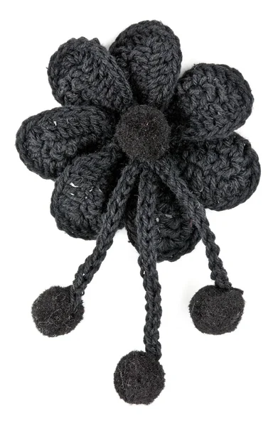 Black knitted fabric flower — Stock Photo, Image