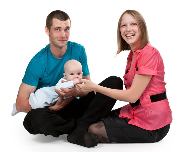 Mamma e papà con un bambino — Foto Stock