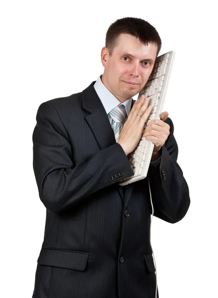 Empresário com um teclado na cabeça — Fotografia de Stock