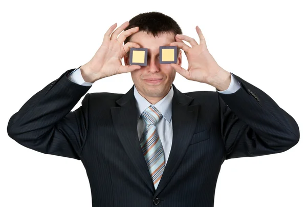 Businessman turned a blind eye two processors — Stock Photo, Image