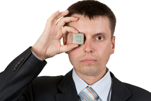Üzletember bezárja egy szem, egy processzor — Stock Fotó