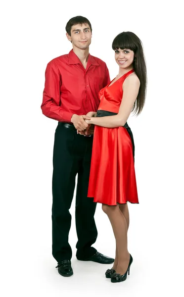 Man and woman in a red dress — Stock Photo, Image