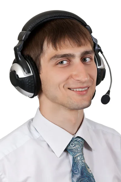 Zakenman in overhemd en stropdas in de koptelefoon — Stockfoto