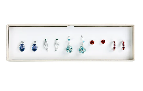 Five pairs of earrings with stones — Stock Photo, Image