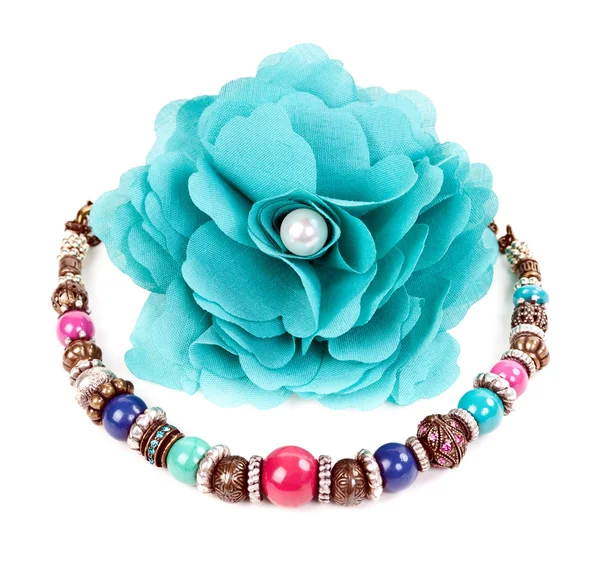 Turquoise fabric flower and color bracelet — Stock Photo, Image