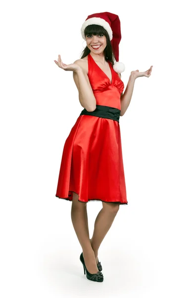 Dziewczynka w czerwonej sukience, kapelusz santa — Zdjęcie stockowe