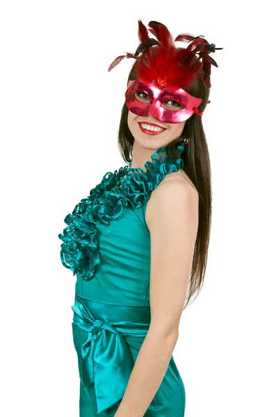 Brunette meisje in een blauwe jurk en masker — Stockfoto