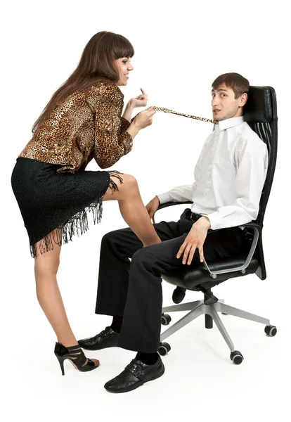 She pulls a businessman tie — Stock Photo, Image