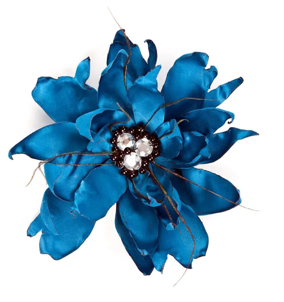 Цветок из голубой ткани с кристаллами — стоковое фото