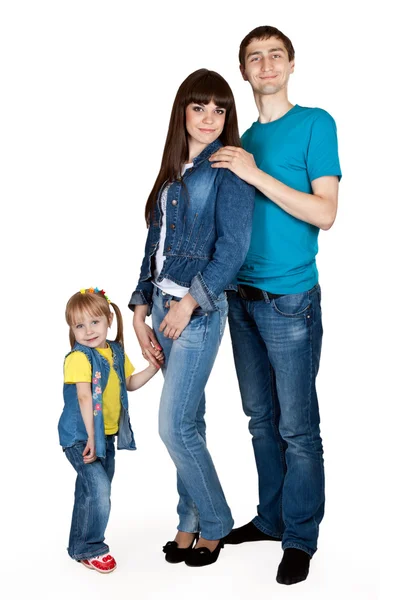 Отец, мать и маленькая дочь в джинсах — стоковое фото