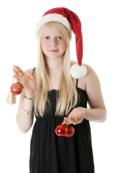 Ung vacker flicka i en santa hatt — Stockfoto
