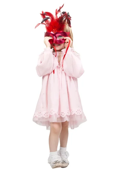 Klein meisje in een rode masker in studio — Stockfoto