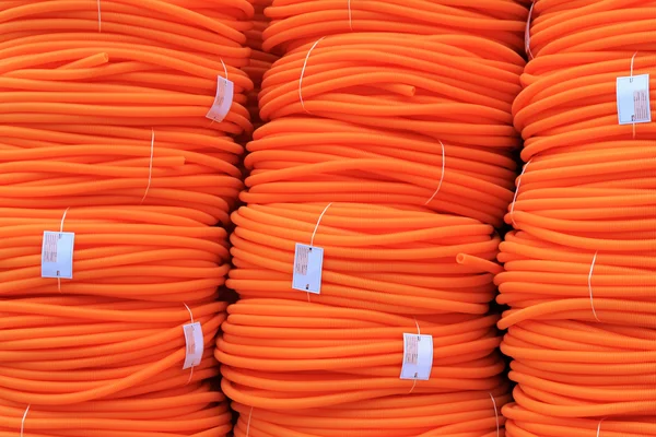 Czerwony cewkipomarańczowy rury — Zdjęcie stockowe