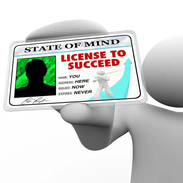 Ліцензія на успіх - Успішна людина тримає спеціальний знак — стокове фото