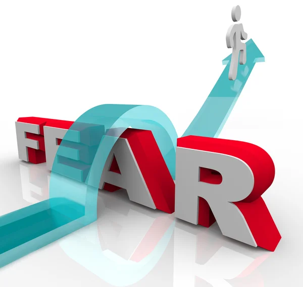 Conquering Your Fears - Jumping Over Word to Beat Fear — Stock Photo ...