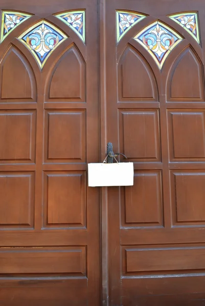 stock image Clean doorplate on the handle of a wooden door