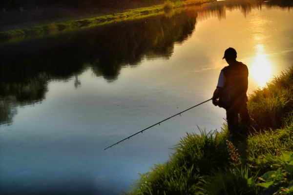 Fiske vid solnedgången — Stockfoto