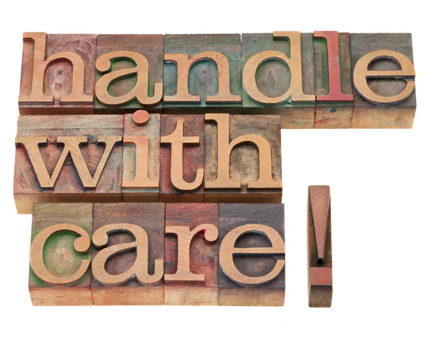Handle with care in letterpress type — Stockfoto