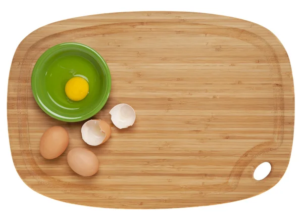 Eggs on bamboo board — Stock Photo, Image