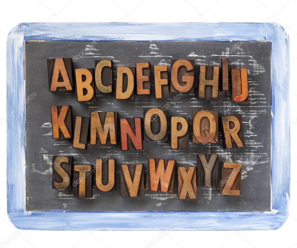 Letterpress alphabet on blackboard