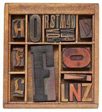 Antique letterpress type with letter F clipart