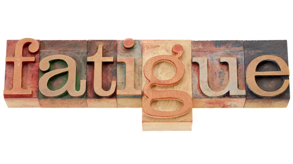 Fatigue word in letterpress type — Zdjęcie stockowe