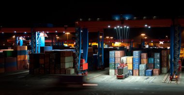 Commercial Container Port At Night clipart