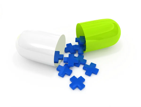 Öppna piller kapsel med första hjälpen-symboler — Stockfoto
