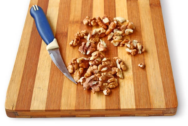Орехи и нож — стоковое фото