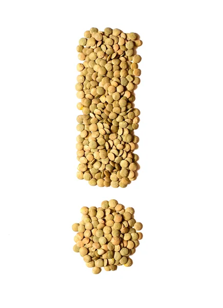 Exclamation mark from lentil — Stock Photo, Image