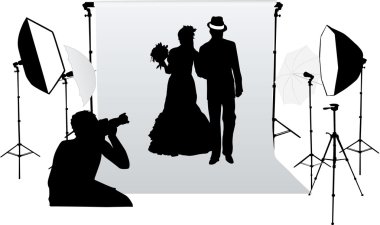 Wedding photo session in a professional studio clipart